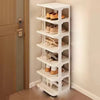 A white stackable vertical shoe rack with multiple tiers holding various pairs of shoes.