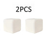 Two white squishy milk tofu stress relief fidget toys