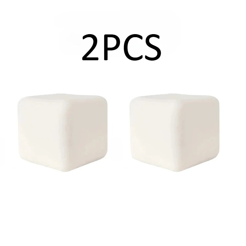 Two white squishy milk tofu stress relief fidget toys