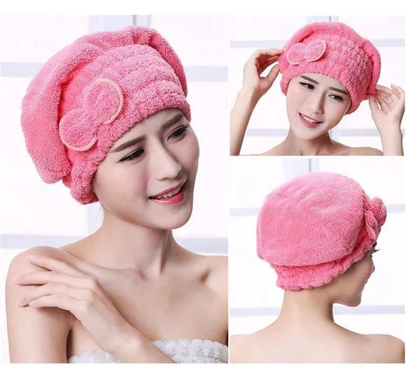Pink microfibre quick-dry hair towel wrap with a bowknot shown on a woman's head and shoulder.