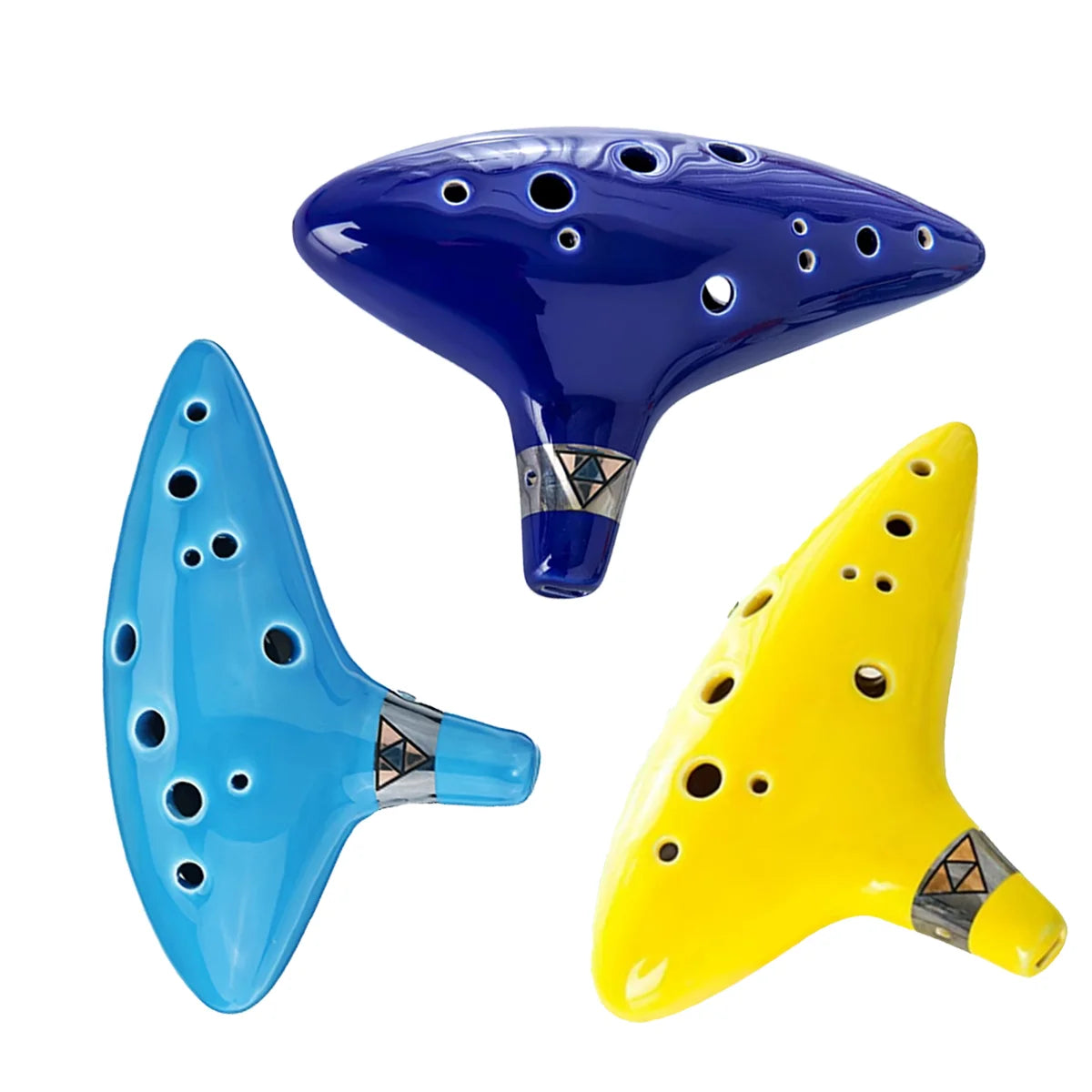 Three ceramic ocarinas in blue, light blue, and yellow with music books and storage bags