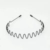 Schwarzes Metal-Elastband mit gewellter Textur