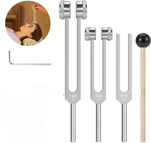A set of three metal tuning forks (128Hz, 256Hz, 512Hz) for sound healing displayed next to a woman's ear.