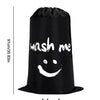 A black drawstring laundry bag with the text wash me printed on it.