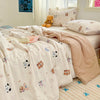 A light beige duvet cover with a floral pattern and lace trim is displayed on a bed.