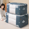 A light blue foldable storage bag for blankets and clothes, featuring white padding and heart and cloud patterns.