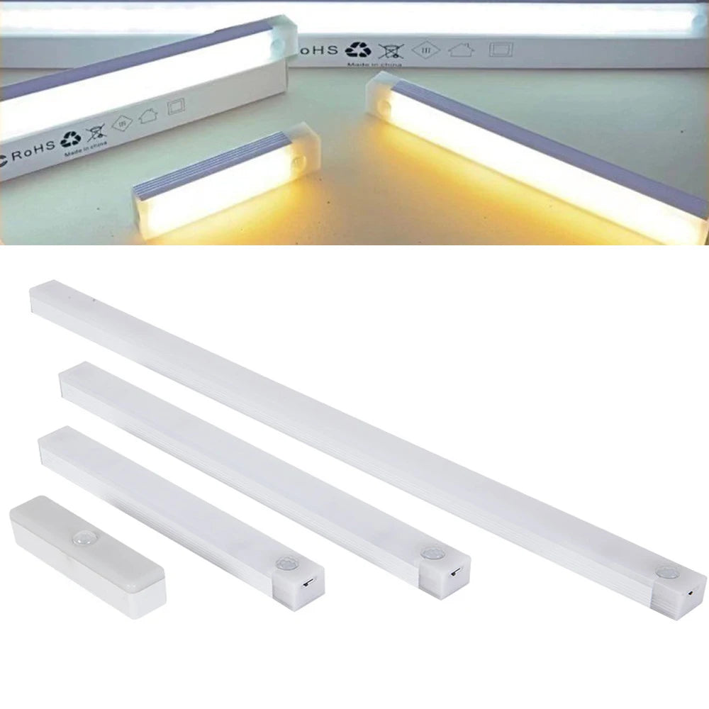 A set of white motion-activated USB rechargeable LED cabinet lights shown in various lengths.