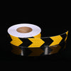 Roll of yellow and black high-visibility reflective safety tape for vehicles