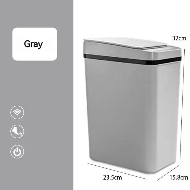 A modern gray slim touchless trash can with a lid and sensor, shown from the side.