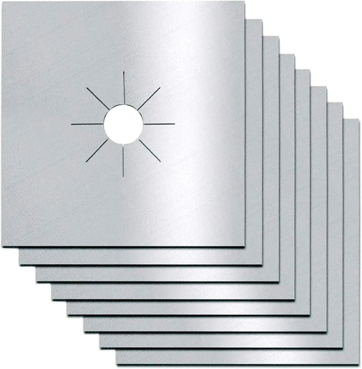 A stack of square heat-resistant stove burner covers, showing a silver metal plate with radiating lines.