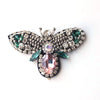 Handcrafted rhinestone bee sew-on patch featuring iridescent pink and green gemstones