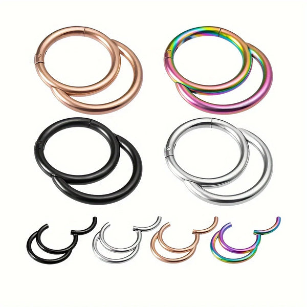 Un set de cinq anneaux à nez en acier inoxydable durable dans différentes couleurs, dont or rose, argent et rose iridescent.