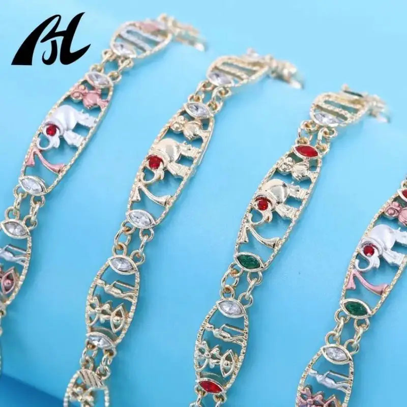 Symbolic Charm Bracelet with Elephant, Horseshoe & Evil Eye Pendants