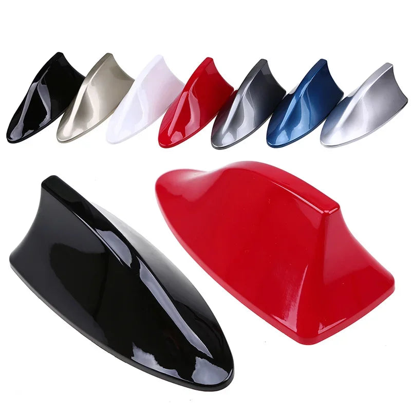 A collection of various colored car shark fin antenna covers shown in different angles.