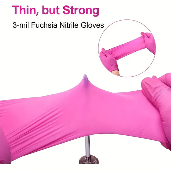 Pink nitrile gloves shown in use, demonstrating thin but strong grip.