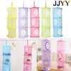 A set of three-tier mesh hanging storage organizers in various pastel colors including yellow, purple, pink, and blue.