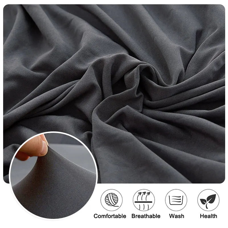 Close-up of a dark gray fabric sofa cushion cover showing the texture and elastic edge, highlighting comfort, breathability, 