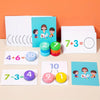 A set of colorful arithmetic block cards showing addition and subtraction problems like 7+3= and 4+6=
