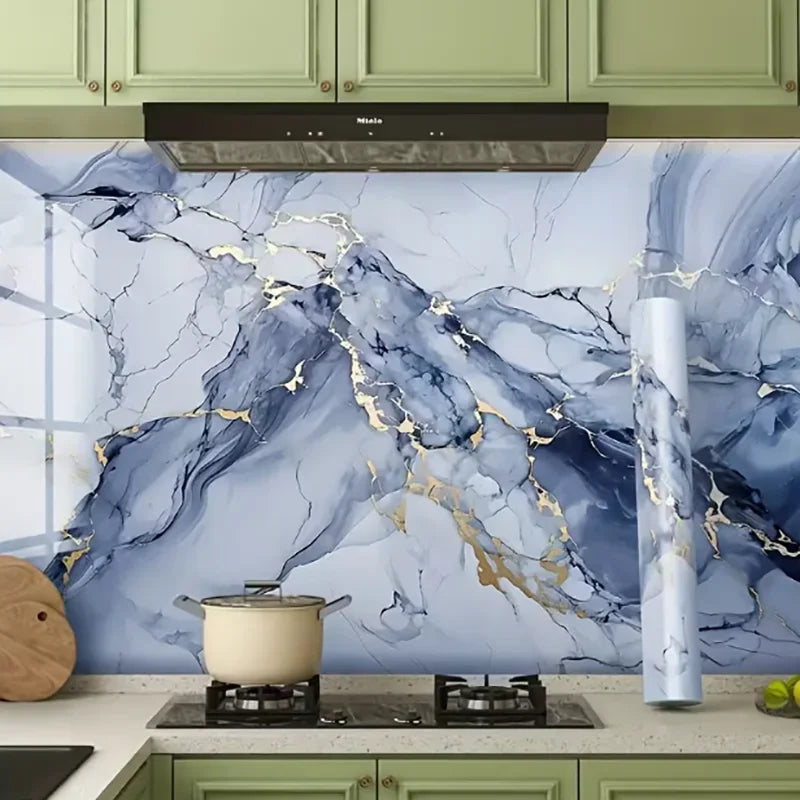 Marble pattern peel and stick wallpaper featuring blue and white marble with gold veining on a kitchen backsplash.