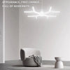 Modern white pendant light fixture illuminating a minimalist interior space.