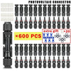 A collection of black photovoltaic connectors for PV cables, packaged as a kit with 600 pieces.