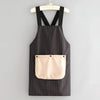 Black and white striped waterproof kitchen apron with a removable beige towel