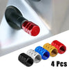 Set of four red and black aluminum alloy wheel tire valve caps with hexagon design
