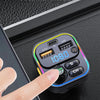 A hand is interacting with a black Bluetooth FM transmitter device, highlighting its features for hands-free calls.