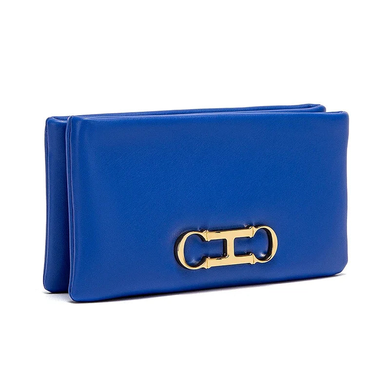 A royal blue compact zipper wallet or clutch with gold-toned hardware.
