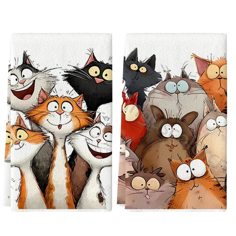 A set of two cartoon cat kitchen towels featuring various feline characters in black, orange, and white.