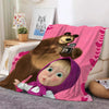 A fleece throw blanket featuring a cartoon bear and a baby face design in pink and purple tones.