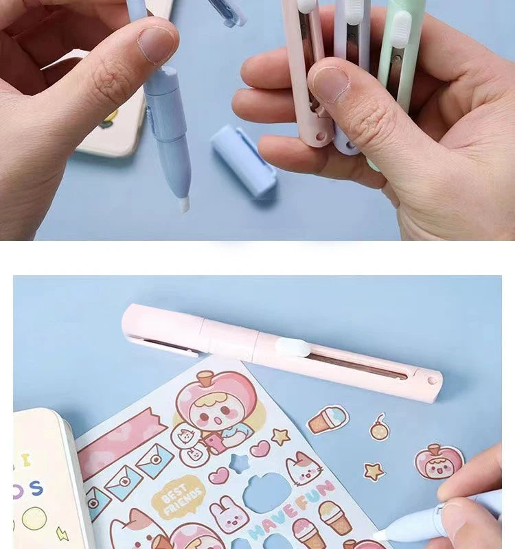 A hand holds a pink mini pen-shaped scissors and cutter tool next to various small plastic items.