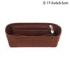 A brown felt bag organizer with a zippered compartment and a small attached tag.