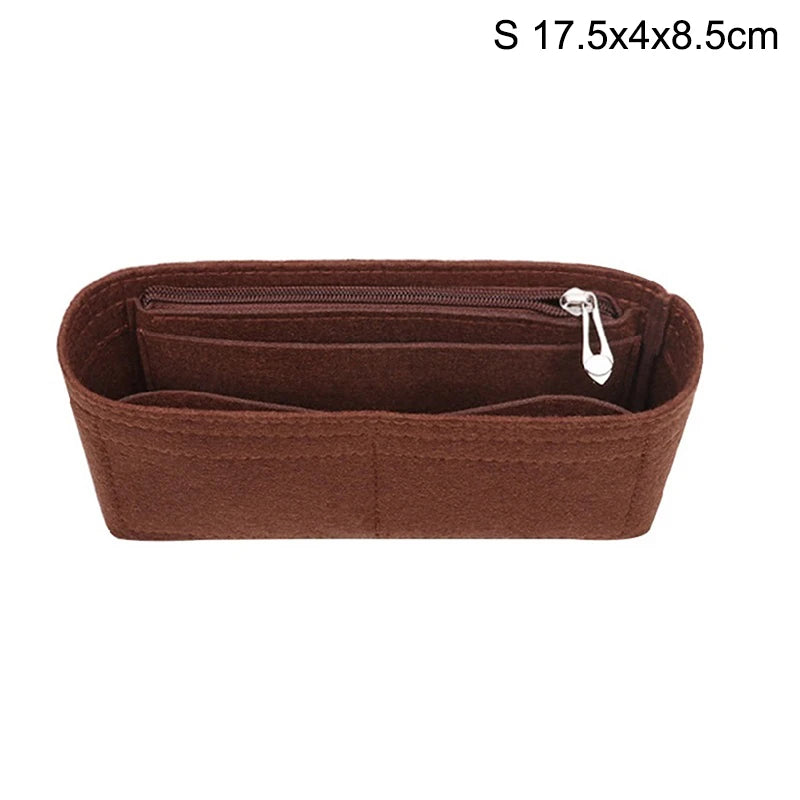 A brown felt bag organizer with a zippered compartment and a small attached tag.