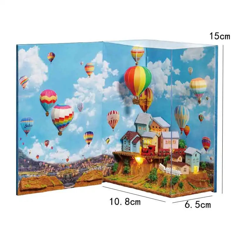 A wooden 3D puzzle book shelf insert kit depicting a colorful magic house scene with balloons in a blue sky.
