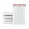 Stack of white padded bubble mailers with self-seal closure