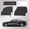 Four black car window mesh sun shade covers displayed next to a black sedan.