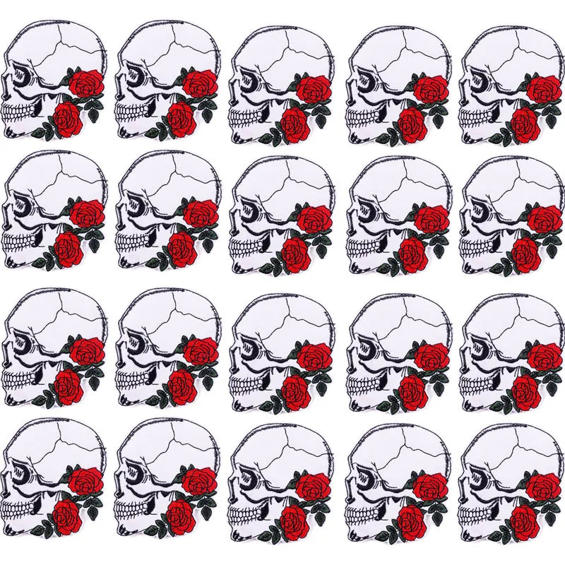 A set of ten embroidered iron-on patches depicting skulls with red roses.