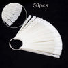 A fan-shaped set of clear acrylic false nail tips for practice and display, showing 50 pieces.