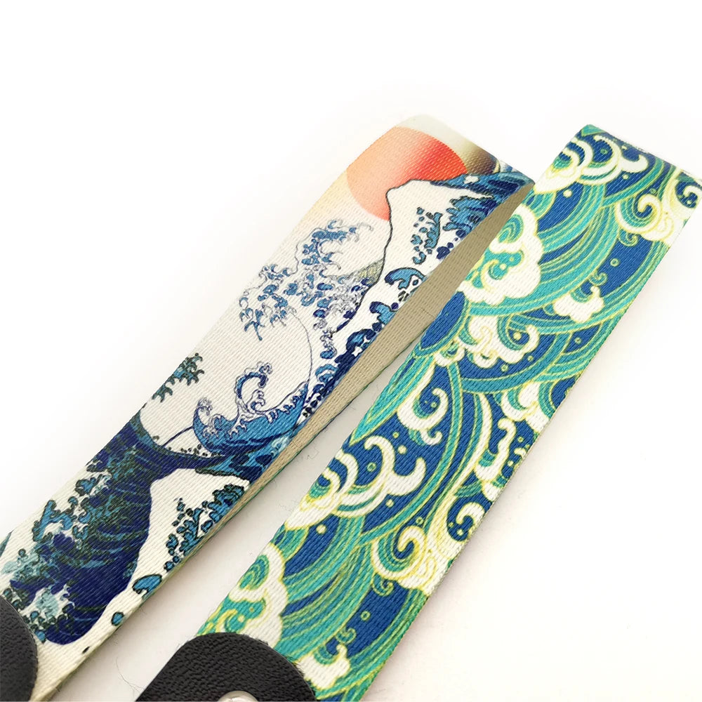 Hokkaido Wave JDM keychain featuring a Kanagawa surf design with blue and green waves.
