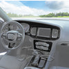 Interior view of a Dodge Charger showing carbon fiber trim and dashboard components.