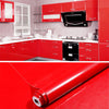Roll of red marble peel-and-stick film for kitchen backsplash