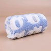 A fluffy, light blue and white cartoon elephant flannel pet blanket for dogs and cats.