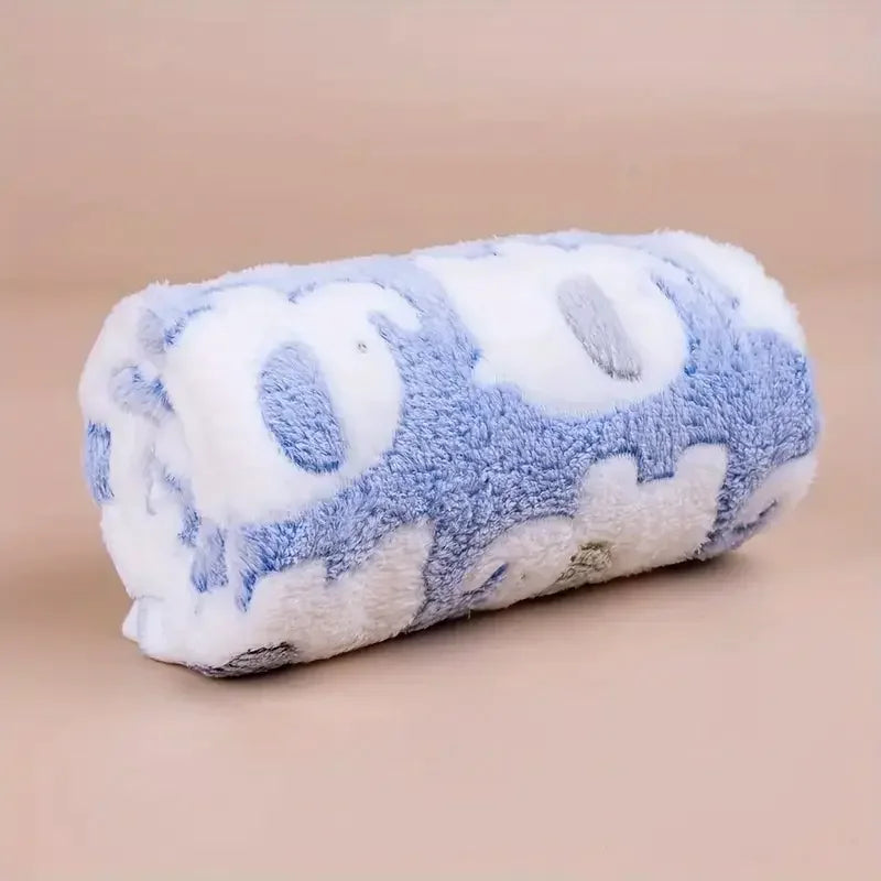A fluffy, light blue and white cartoon elephant flannel pet blanket for dogs and cats.