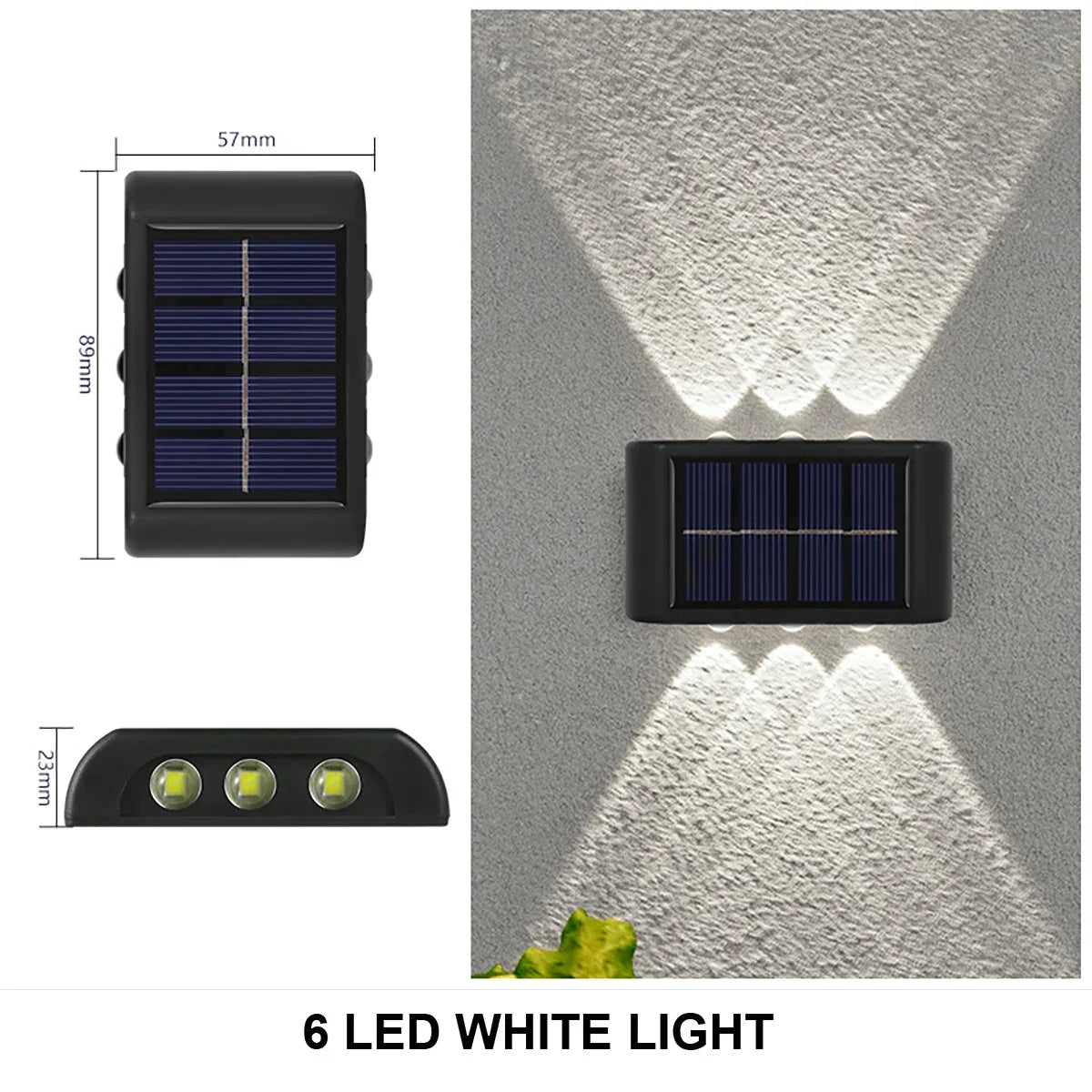A black solar powered wall light with six LED white lights casting illumination upwards and downwards on a gray textured wall