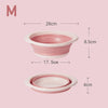 A pink foldable travel wash basin shown with dimensions of 28cm and 8.5cm.