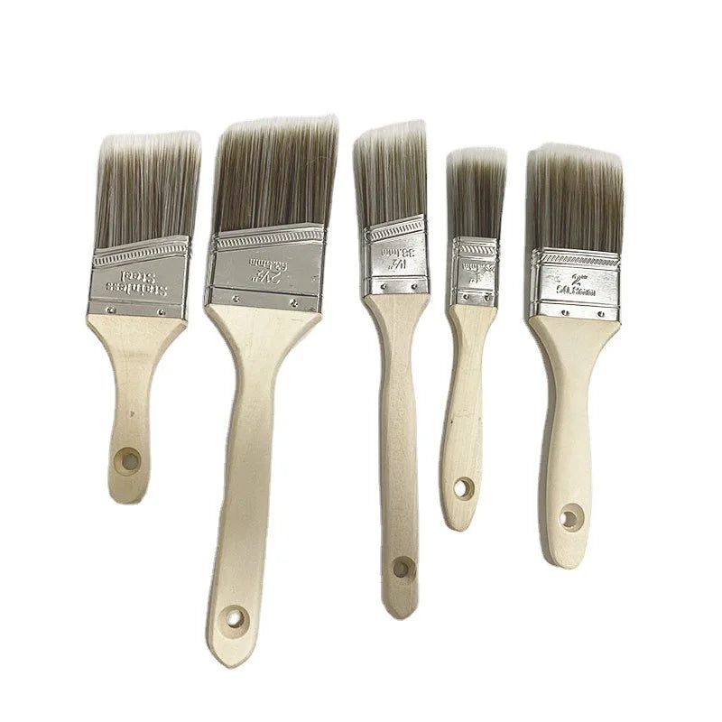 A set of five paint brushes with light wooden handles and metal ferrules for interior and exterior projects.