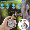 A hand holds a water pressure test gauge connected to a garden hose, demonstrating its use for measuring water pressure.