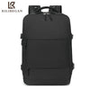 A black durable nylon travel laptop backpack with multiple compartments.