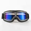 A pair of black retro foldable motorcycle goggles with blue mirrored lenses.